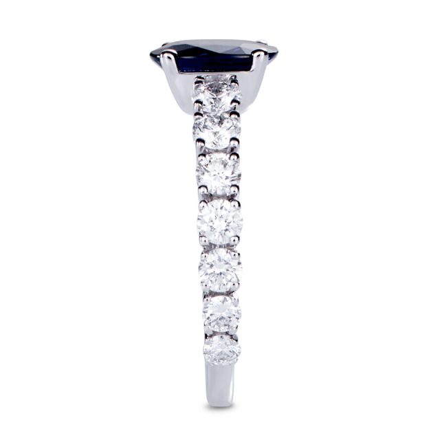 Oval cut blue sapphire and white diamond ring in white gold