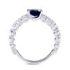 Oval cut blue sapphire and white diamond ring in white gold