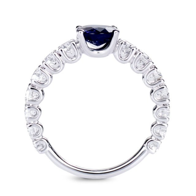 Oval cut blue sapphire and white diamond ring in white gold