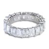 Eternity band in platinum with emerald cut white diamonds