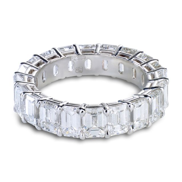 Eternity band in platinum with emerald cut white diamonds
