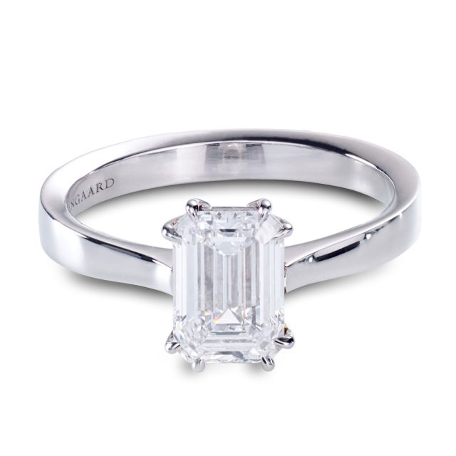 Solitaire emerald cut diamond ring in platinum