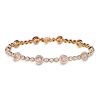 Exclusive rosette bracelet in rose gold with champagne and white diamonds