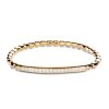 One row stretch bracelet in yellow gold and white diamonds
