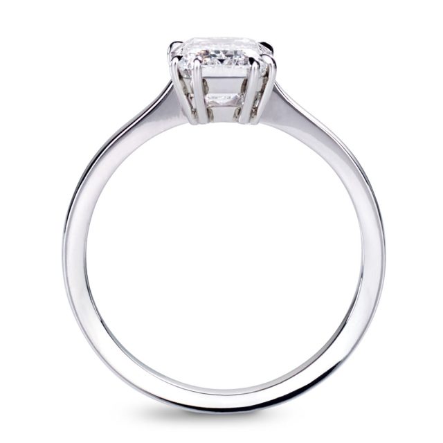 Solitaire emerald cut diamond ring in platinum