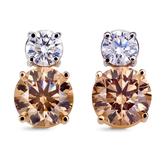 Two stone white and champagne coloured diamond earrings