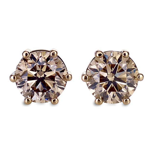 Solitaire champagne coloured diamond studs in rose gold