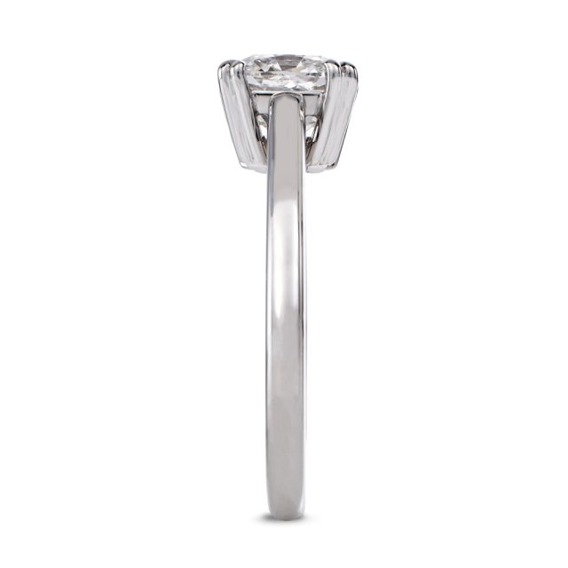 Solitaire platinum ring with cushion cut white diamond