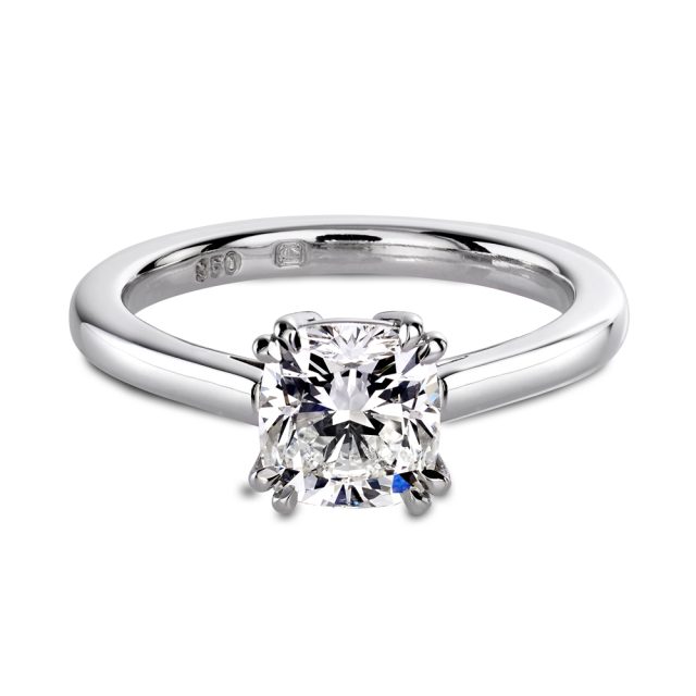 Solitaire platinum ring with cushion cut white diamond