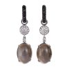 Creol collection earrings in white gold with white diamonds, moonstones and black diamonds
