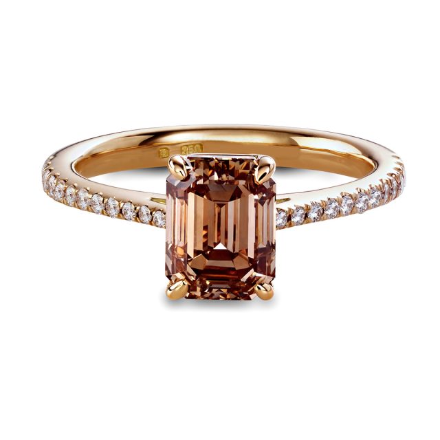 Engagement ring in rosé gold with emerald cut champagne coloured diamond