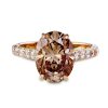 Oval champagnefarget diamantring i roségull