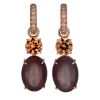 Creol earrings in rose gold with moon stone and imperial zircon.