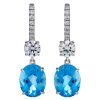 Earrings in white gold with diamonds and oval cut aquamarines